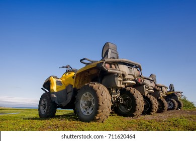 Atvs Parked Row On Land Near Stock Photo 711620464 | Shutterstock