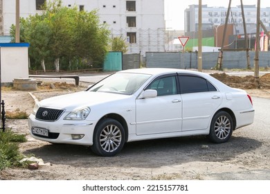 Atyrau, Kazakhstan - October 3, 2022: White Luxury Car Toyota Crown Majesta (S180) In The City Street.