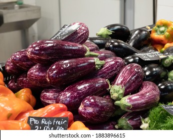 Aubergines With Red And Green Peppers On Palma Market Stall