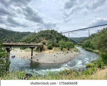 Auburn, CA - June 2, 2020: Wide view of the famous Forest Hill bridge from below near American River. 
