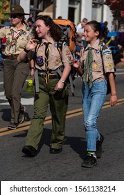 AUBURN, CA/U.S.A. - NOV. 11, 2019: Two Unidentified Female Boy Scouts March In The Annual Veterans Day Parade, The Largest One Of Its Kind In The Western U.S.