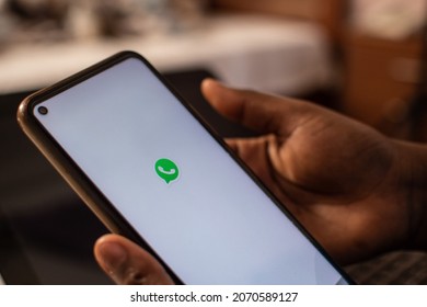 Auchi, Edo-Nigeria-June 12, 2021: Person Launching Whatsapp