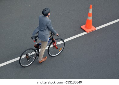 AUCKLAND - APR 19 2017:Aerial View Of One Young Adult Man (male Age 30-40) Cycling On City Road. There Are Over One Billion Bicycles Found Throughout The World.