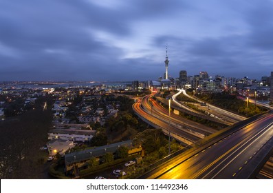 Auckland City Lights/ Auckland's CBD After Dusk During A Storm, Hence The Wet Roads And Dramatic Sky