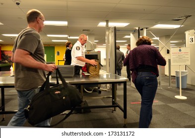 AUCKLAND - DEC 31 2013:Airport Security Checkpoint.Since The 1970s, Air Terrorism, Hijackings And Bombings Became The Method Of Choice For Subversive, Militant Organizations Around The World.