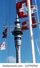 AUCKLAND - MARCH 1:The Sky Tower With The Swiss Flags Of Alinghi Team On March 1 2003 In Auckland, New Zealand.It Was Contested Between Team NZ And The Winner Of The 2003 Louis Vuitton Cup Alinghi