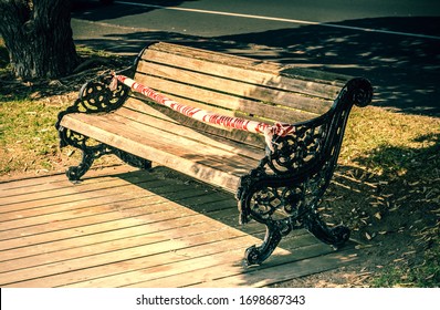 Auckland, NEW ZEALAND - April 5, 2020: A Waterfront Bench Is Closed With A Police Tape During Covid-19 Lockdown