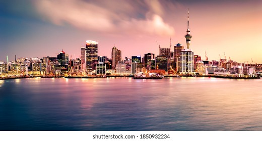 AUCKLAND, NEW ZEALAND - Aug 18, 2018: Panoramic View Of Auckland City Skyline And Harbour At Sunset. Auckland Is Known As The 