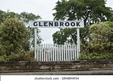 Auckland, New Zealand - January 16, 2021: View Of Glenbrook Railway Station Sign