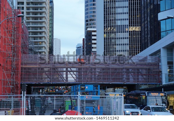 AUCKLAND, NEW ZEALAND - JULY 25, 2019:\
Construction industry growth for continuing population growth on\
the road in Auckland city, New\
Zealand.