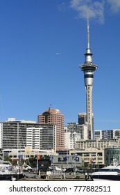AUCKLAND, NEW ZEALAND - JUNE 14, 2012: Auckland Skyline. View From The Port With Residential And Commercial Buildings, Sky Tower And Boats.