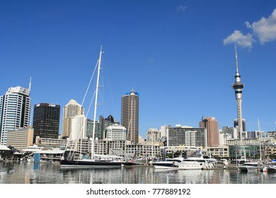 AUCKLAND, NEW ZEALAND - JUNE 14: Auckland Skyline. View From The Port In Auckland, With Residential And Commercial Buildings, Sky Tower And Boats.
