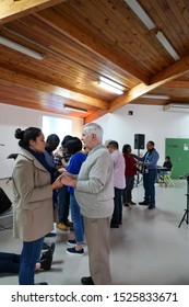 Auckland, Auckland / New Zealand - June 24 2019: Church Elders Praying For Congregation During A Christian Worship Meeting At His Church, Auckland.