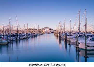 AUCKLAND, NEW ZEALAND - MARCH 20, 2018: View Of Auckland Harbour Bridge And Westhaven Marina At Sunset On March 20, 2019. Auckland Is Also Known As The 