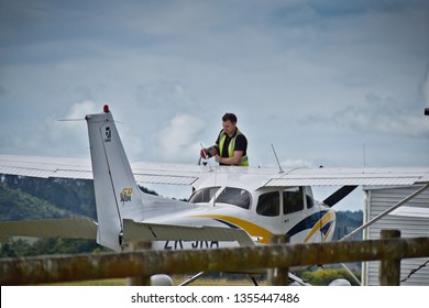 Auckland  New Zealand - March 30 2019: Pilot refueling Cessna airplane