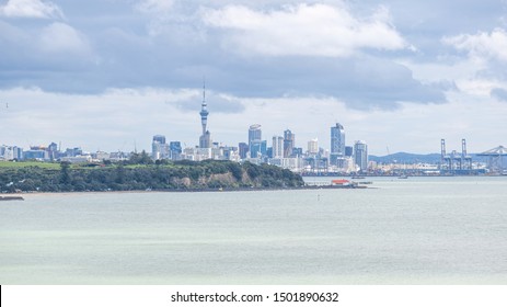 Auckland / New Zealand - September 10 2019: Distant View Of Auckland City Skyline From Mission Bay