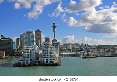 Auckland New Zealand Skyline and Shoreline with Puffy Clouds