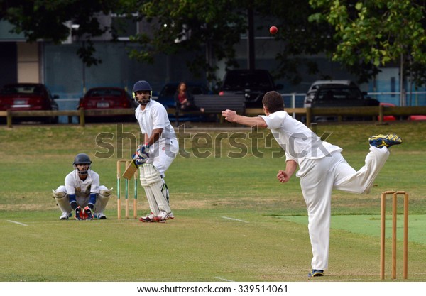 AUCKLAND - NOV\
14 2015:Cricket bowler bowling to a batsman..It\'s one of New\
Zealand most popular national sport and the first recorded game\
took place in Wellington in December\
1842.
