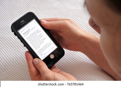 AUCKLAND - NOV 26 2017:Person Reads A Text Massage From New Zealand National Emergency Management Agency Civil Defense That Was Sent Out A Test Emergency Alert To Every Cellphone In New Zealand. 