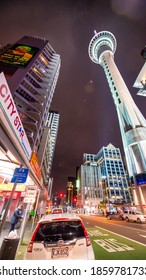 AUCKLAND, NZ - AUGUST 26, 2018: Sky Tower And Auckland Buildings At Night.