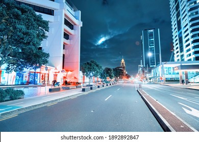 AUCKLAND, NZ - AUGUST 26, 2018: Waterfront Streets And Buildings At Night.