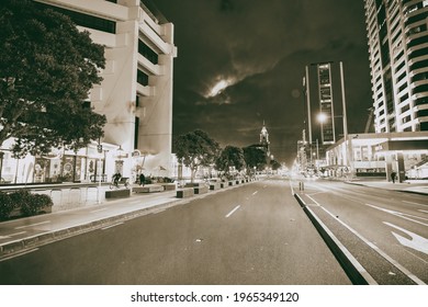 AUCKLAND, NZ - AUGUST 26, 2018: Waterfront Streets And Buildings At Night.