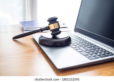 Auction hammer on a laptop, online auction concept illustration - Shutterstock ID 1801152595