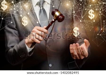 The auctioneer conducts the auction online on a dark background.