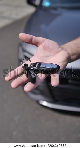 Audi A6 keys in\
hand