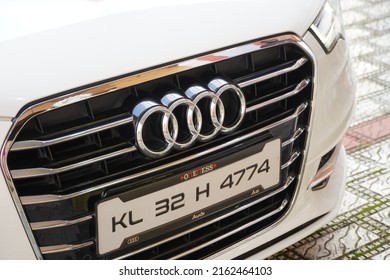 Audi decorated with flowers in indian wedding celebration. People present. - Goa India May 2022