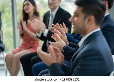 Audience Applauding Speaker In Business Event At Meeting Room