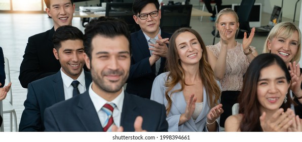 Audience Applauding Speaker In Business Event At Meeting Room