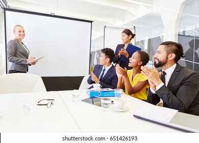 Audience In Business Seminar Clapping After Lecturer's Presentation