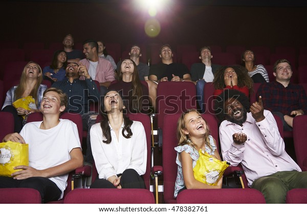 Audience In Cinema\
Watching Comedy Film