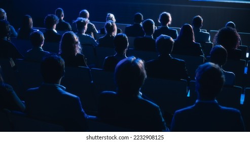 Audience Full of Tech People in Dark Conference Hall Watching an Innovative Inspiring Keynote Presentation. Business Technology Summit Auditorium Room Crowded with Delegates. Static Shot from Behind. - Shutterstock ID 2232908125