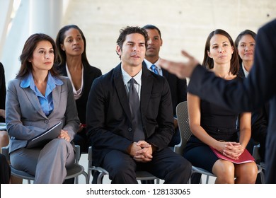 Audience Listening To Presentation At Conference