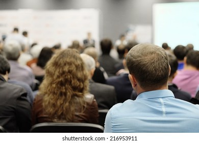 The audience listens to the acting in a conference hall - Shutterstock ID 216953911
