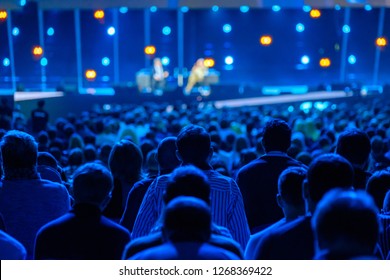 Audience listens to the lecturer at the business conference, back view - Shutterstock ID 1268369422