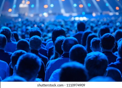 Audience listens to the lecturer at the conference hall - Shutterstock ID 1110974909