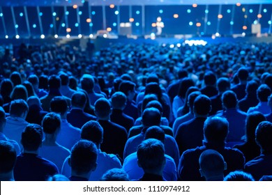 Audience listens to the lecturer at the conference hall - Shutterstock ID 1110974912