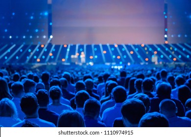 Audience listens to the lecturer at the conference hall - Shutterstock ID 1110974915