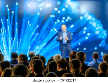 Audience listens to the lecturer at the conference hall - Shutterstock ID 704922217