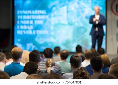 Audience Listens To The Lecturer At The Conference Hall