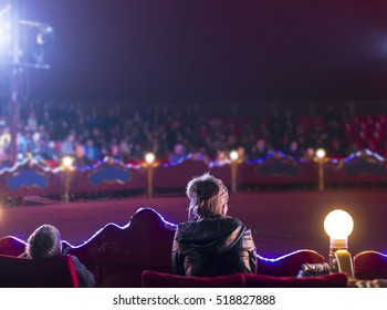 Audience On Circus. Mom And Child Watching Circus.