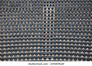 Audience Seats - Empty Concert Venue In France. Grey Plastic Chairs.