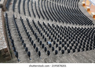 Audience Seats - Empty Event Venue In France. Grey Plastic Chairs.