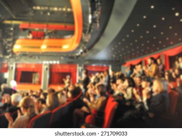 Audience In A Theater, On A Concert  And Applauding