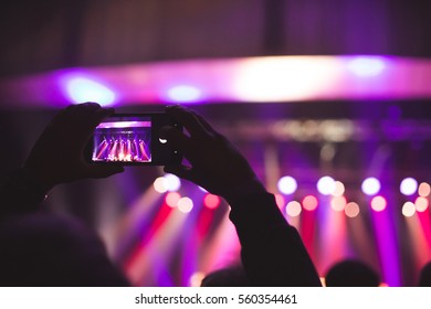 The Audience Watching The Concert On Stage.