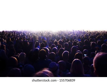 Audience is watching a luminous surface. - Shutterstock ID 155706839