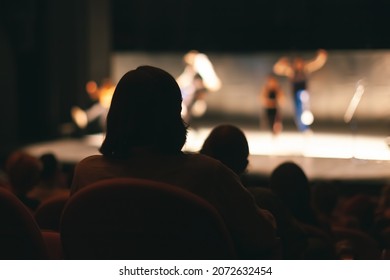 Audience Watching A Theatre Play